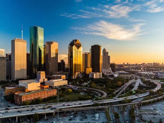 Aerial view of downtown Houston at sunset.