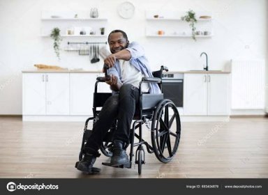 Full Length Portrait African American Wheelchair User Video Game Controller Stock Photo by ©sofiiashunkina@gmail.com 683404878