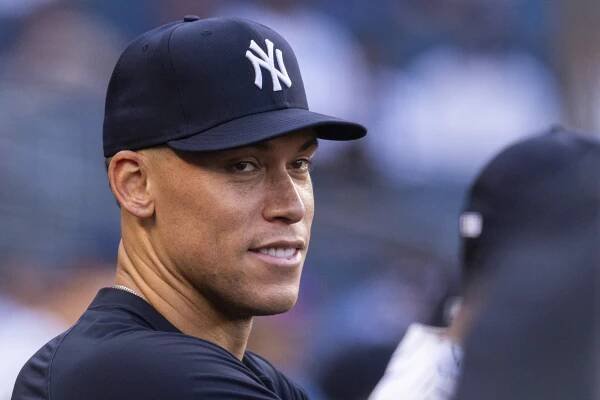 New York Yankees Aaron Judge is all smiles in the dugout during the first inning against the Tampa Bay Rays at Yankee Stadium, Monday, July 28, 2025, in Bronx, NY. 