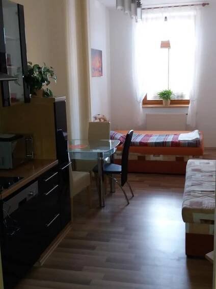 Postel nebo postele na pokoji v ubytování Apartmány u náměstí Sušice