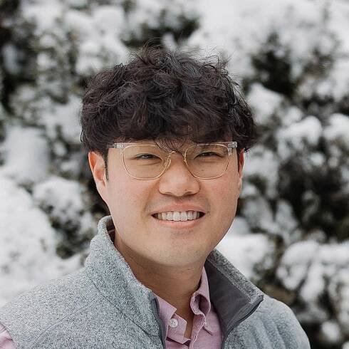 Staff member Dan Suh headshot in front of North Shore Baptist Church in Bayside, NY