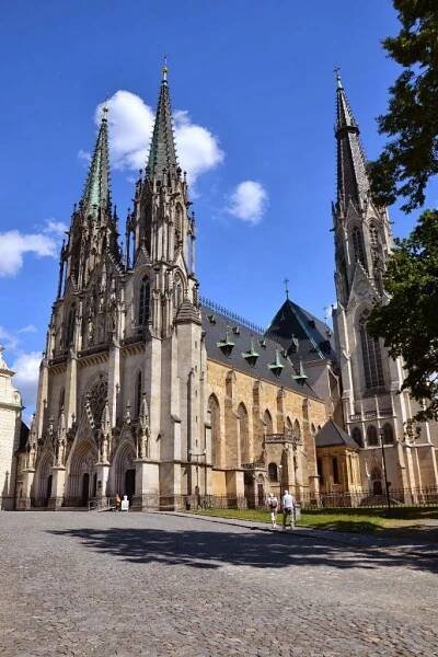 the large cathedral has many spires on it's sides