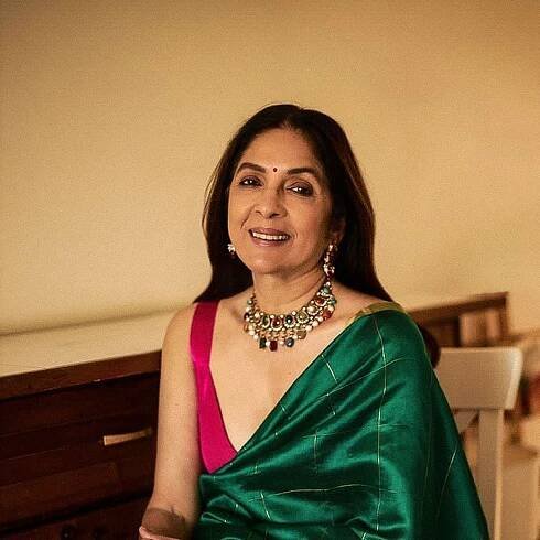 Neena Gupta wore a chic emerald green Raw Mango sari perfect for summer weddings