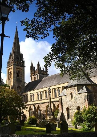 Exterior of Llandaff Cathedral on a sunny day.