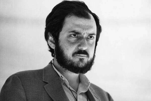 Stanley Kubrick in a black and white portrait. 