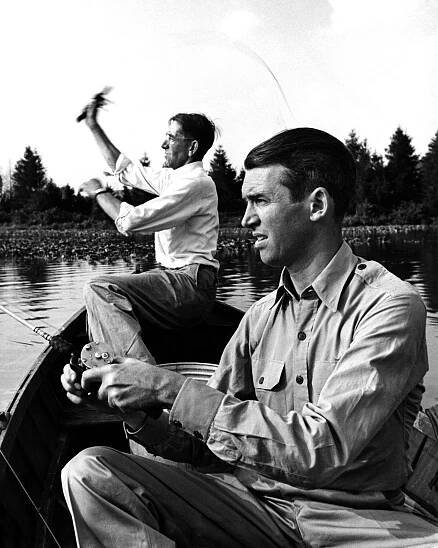 Jimmy Stewart went fishing with his old friend Clyde "Woodie" Woodward, 1945.