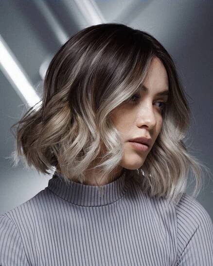 Dimensional brunette bob with shimmering caramel and pearl blonde balayage for soft glam shine