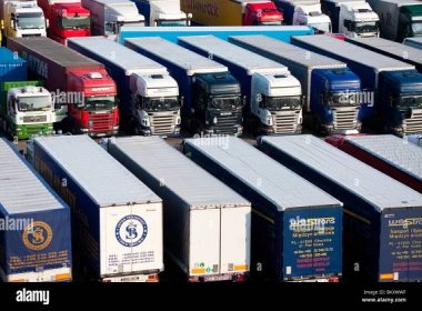 Close up of rows of trucks, lorries, HGVs at a lorry park in Dover harbour. Lorries parked in lines await ferries to France and Belgium. Stock Photo