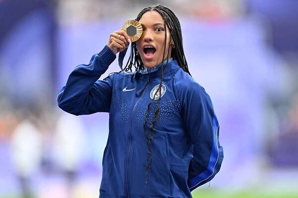 Tara Davis-Woodhall Is Still 'Riding the Wave' of Olympic Gold — but Feels 'Anxiety' as New Season Starts (Exclusive)
