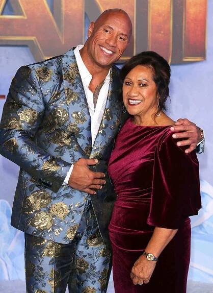 Pictured: (L-R) Dwayne Johnson and his mother Ata Johnson on Dec. 9, 2019