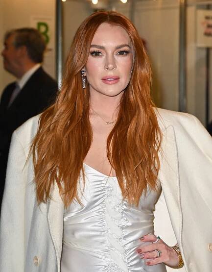 Lindsay Lohan Debuted ‘Churro Hair Thats Perfect for Transitioning From Summer to Fall