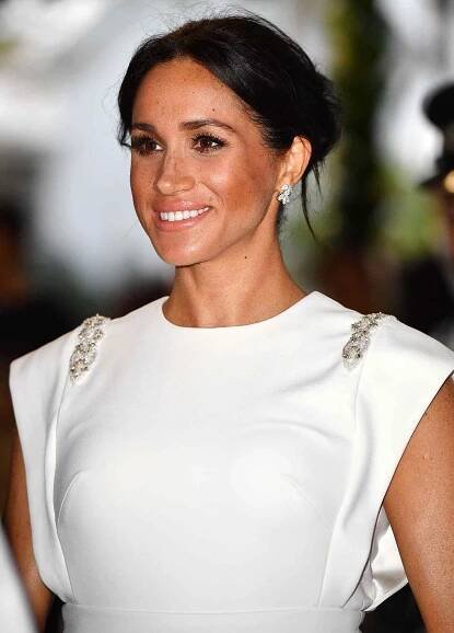 Meghan Markle's Dress Designer Reveals How They Were Quietly Clued Into Her Royal Baby Secret