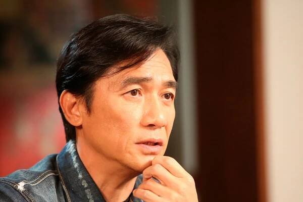 --FILE--Hong Kong actor and singer Tony Leung Chiu-wai shows up at a local talk show and promotes his new movie The Hunting, Shanghai, China, 25 December 2020.  (Imaginechina via AP Images)