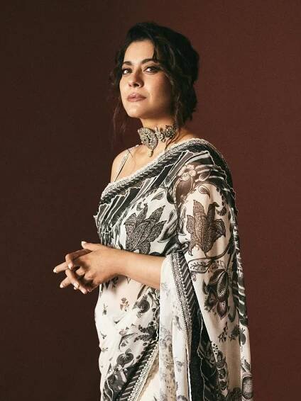 Image may contain Kajol Adult Person Face Happy Head Smile Photography Portrait Accessories Jewellery and Necklace