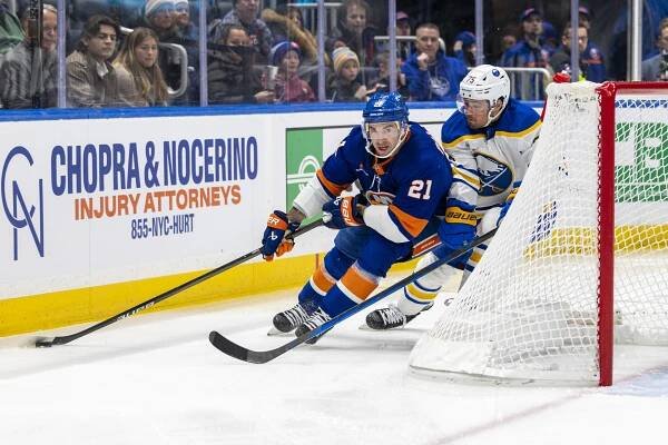 Kyle Palmieri skates with the puck during the Islanders' game Dec. 23.