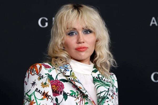 Miley Cyrus Debuts Black Streaks in Her Platinum-Blonde Hair — See Photo