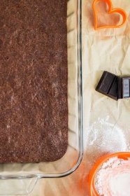 This fudgy healthy brownie recipe is made with clean eating ingredients like spelt flour, unsweetened chocolate, coconut oil and coconut sugar. Cut them into heart-shapes for a healthier sweet Valentine’s Day treat. #brownies #dessert #recipe #healthy #spelt #speltflour #cleaneating #chocolate #treat #valentinesday #easy