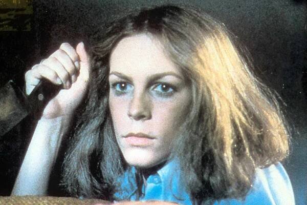 Jamie Lee Curtis holds a knife in a scene from the film 'Halloween', 1978. 