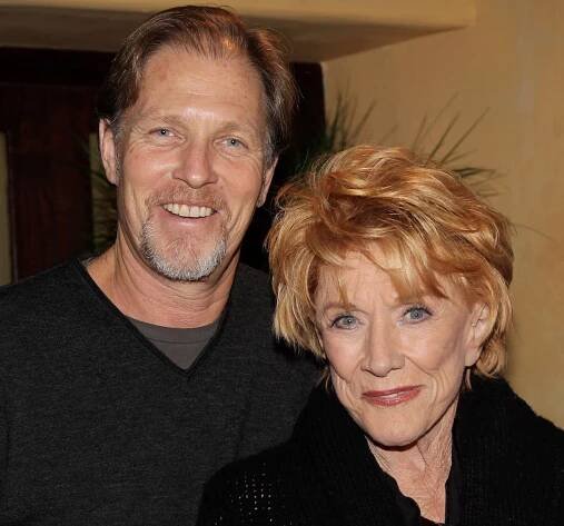 LOS ANGELES, CA - DECEMBER 09: Corbin Bernsen's brother Collin Bernsen (L) poses with his mother actress Jeanne Cooper at the screening of 