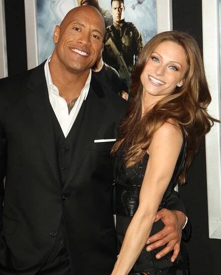 Dwayne Johnson and Lauren Hashian share a joyful moment together on the red carpet, showcasing their strong bond