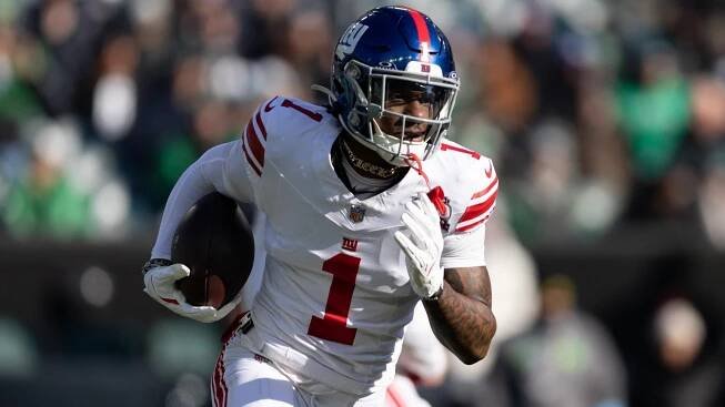 Jan 5, 2025; Philadelphia, Pennsylvania, USA; New York Giants wide receiver Malik Nabers (1) runs with the ball against the Philadelphia Eagles during the first quarter at Lincoln Financial Field. 