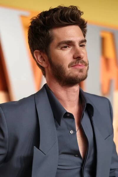 Andrew Garfield is trying to make your grey suit jealous (and frankly, it's working)