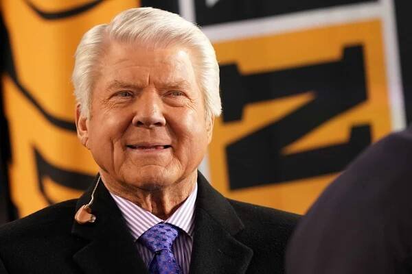 Jimmy Johnson looks on