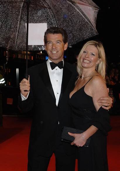 Pierce and Charlotte Brosnan arrive at The Orange British Academy Film Awards (BAFTAs) at the Odeon Leicester Square on February 19, 2006 in London, England | Source: Getty Images