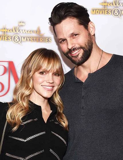Actor Justin Bruening (R) and actress Alexa Havins arrive at the Hallmark Channel "Once Upon A Christmas Miracle" screening and holiday party at 189 by Dominique Ansel on December 4, 2018 in Los Angeles, California