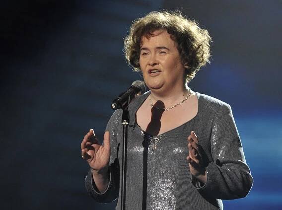 Susan Boyle singing into a microphone.