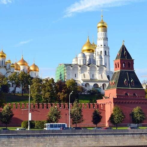 A series of large buildings with golden domes