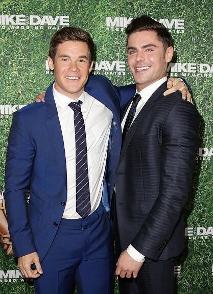 Zac Efron and Adam Devine attend the "Mike And Dave Need Wedding Dates" fan premiere.