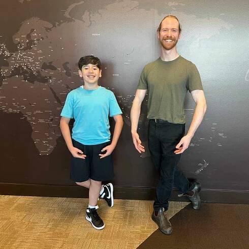Mateo and Ben strike a ballet pose.