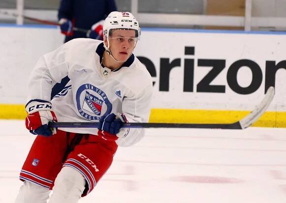 Adam Sykora, New York Rangers prospect, skating with puck.