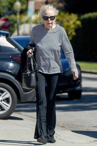 Michelle Phillips is spotted on a very rare outing in Los Angeles. The 80 year old singer is best known for hits like "California Dreamin" as part of the 1960s folk-pop group The Mamas & the Papas.
