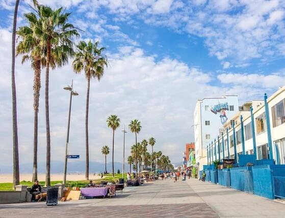 VENICE,CA - DECEMBER 18, 2013: Ocean Front Walk of Venice Beach in Venice, US. This boardwalk is 2.5 kilometer long