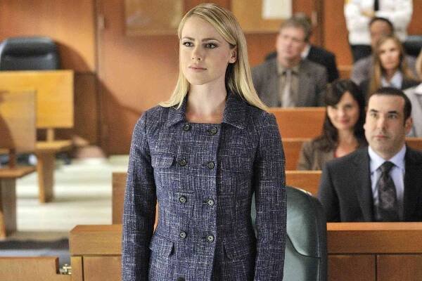 Suits -- "Zane vs. Zane" Episode 213 -- Pictured: (l-r) Amanda Schull as Katrina Bennett, Rick Hoffman as Louis Litt 