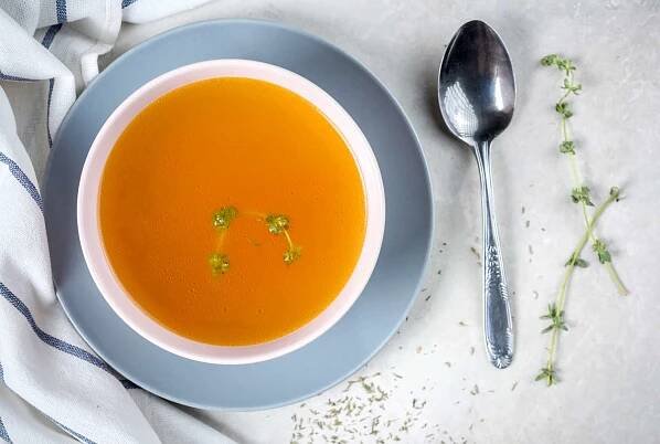 Beef consommé in bowl