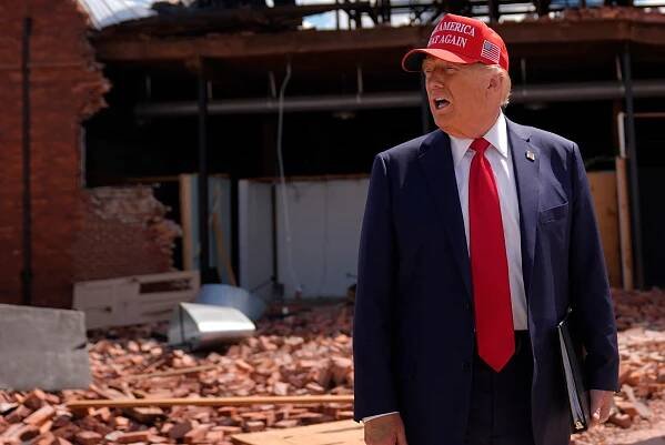 Donald Trump tours downtown Valdosta, Georgia, a town that was impacted by Hurricane Helene, on September 30. The former president and his allies have been spreading false claims about the federal government’s response to the disaster