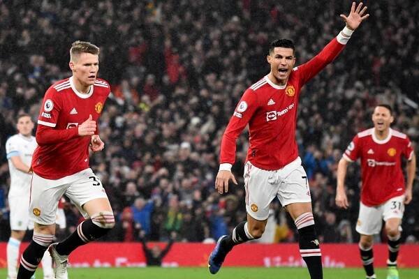 Scott McTominay, left, and Cristiano Ronaldo after scoring at Old Trafford on Thursday night