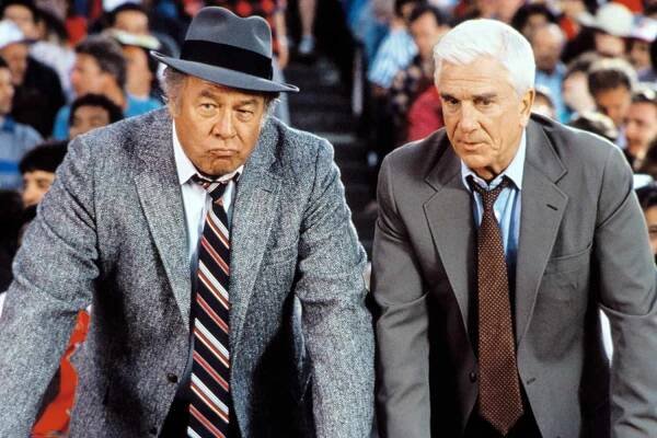 George Kennedy and Leslie Nielsen in NAKED GUN