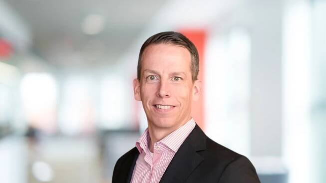 Headshot of Jan-Alexander Huber