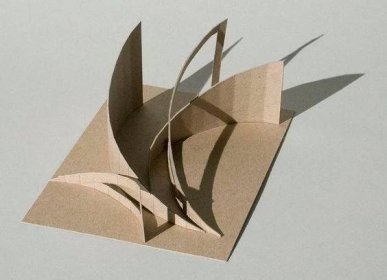 an abstract sculpture is flying through the air