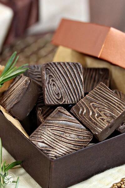 A box of Rosemary Raspberry Truffles with a copper lid.