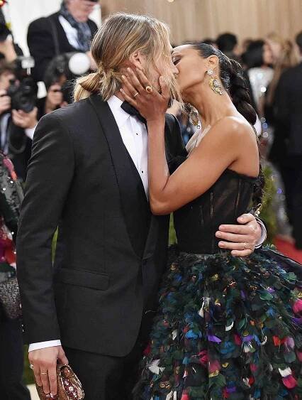 Marco Perego (L) and Zoe Saldana attend the "Manus x Machina: Fashion In An Age Of Technology" Costume Institute Gala at Metropolitan Museum of Art on May 2, 2016 in New York City.