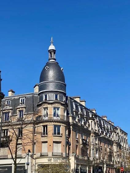 corner building with a domed tower