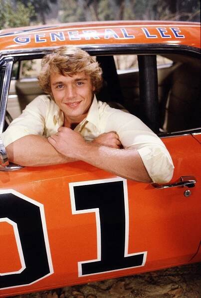 John Schneider stars as Bo Duke in "The Dukes of Hazzard," on January 1, 1982 in Los Angeles, California | Source: Getty Images