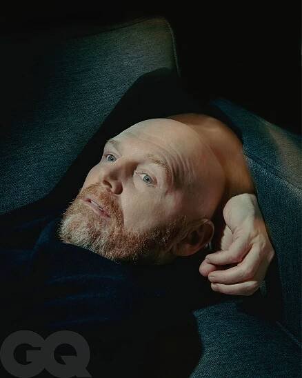 Image may contain Bill Burr Head Person Face Photography Portrait Beard Adult Body Part Finger and Hand