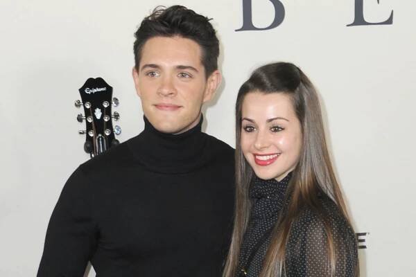 Casey Cott and his fiancée
