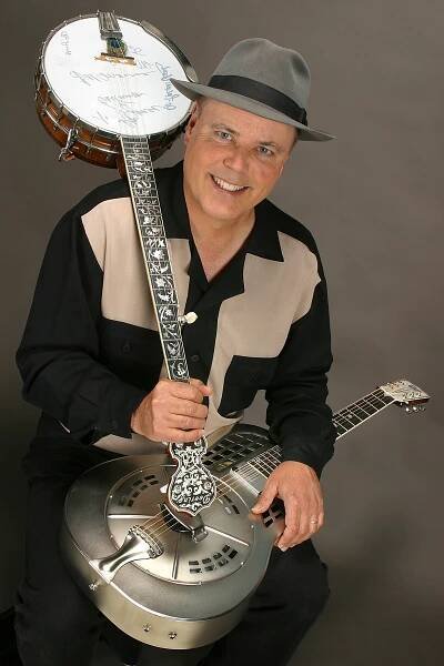 Four-time Grammy Award winner David Holt is a musician, storyteller, historian, television host and entertainer, dedicated to performing and preserving traditional American music and stories. Holt plays ten acoustic instruments and has released numerous award winning recordings of traditional mountain music and southern folktales. In 2002, Doc Watson and David won two Grammy Awards for Best Traditional Folk Recording for “Legacy”, a three CD collection of songs and stories reflecting Doc Watson’s inspiring life story. In 1975, Holt founded and directed the Appalachian Music Program at Warren Wilson College in Swannanoa, North Carolina, the only program of its kind in . The songs and tales Holt has collected for the past twenty years have become a part of the permanent collection of the Library of Congress in Washington, D.C. The U.S. State Department has sponsored Holt’s performances in many parts of the world as a musical ambassador, taking the sounds of American folk music to such diverse lands as Nepal, Thailand, South America and Africa.